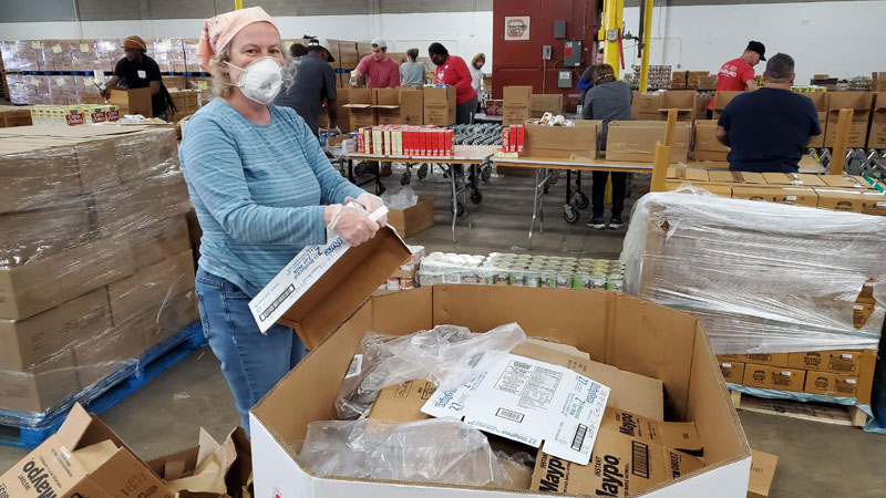 Elizabeth Sopel helping at the offsite warehouse