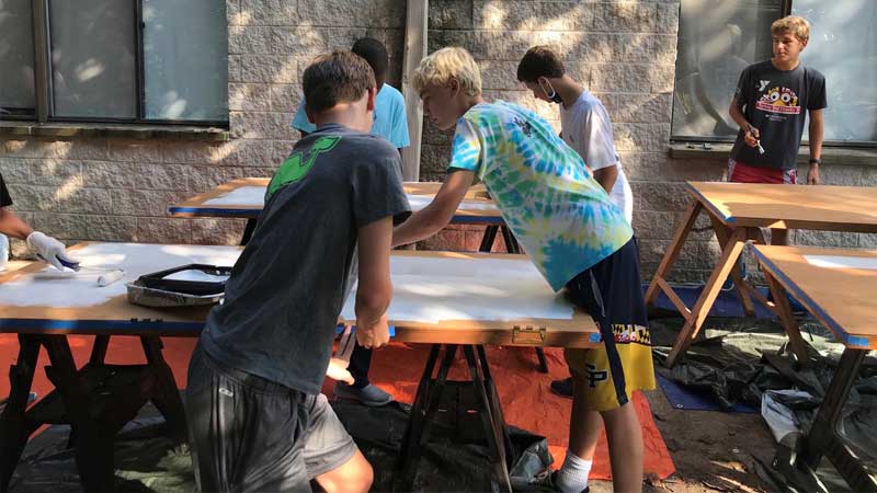 scouts painting pantry doors