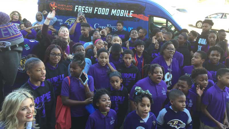 Baltimore Ravens fresh food mobile and children