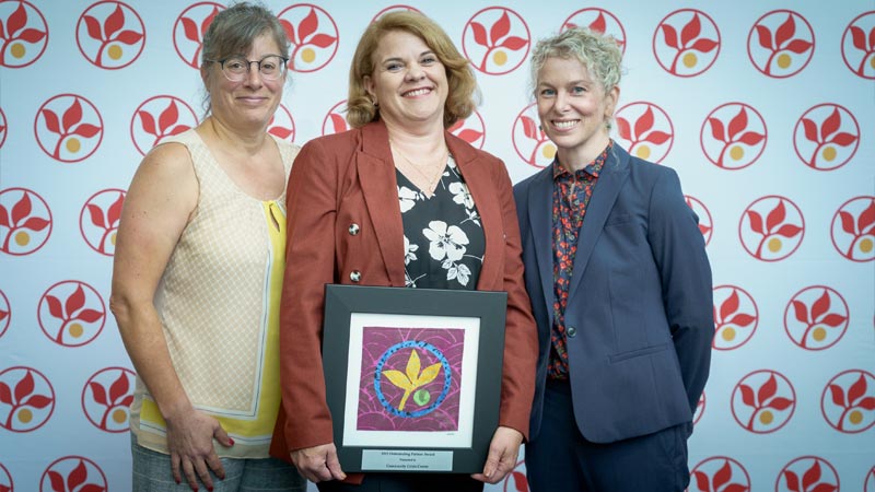 Community Crisis Center holding Outstanding Partner Award