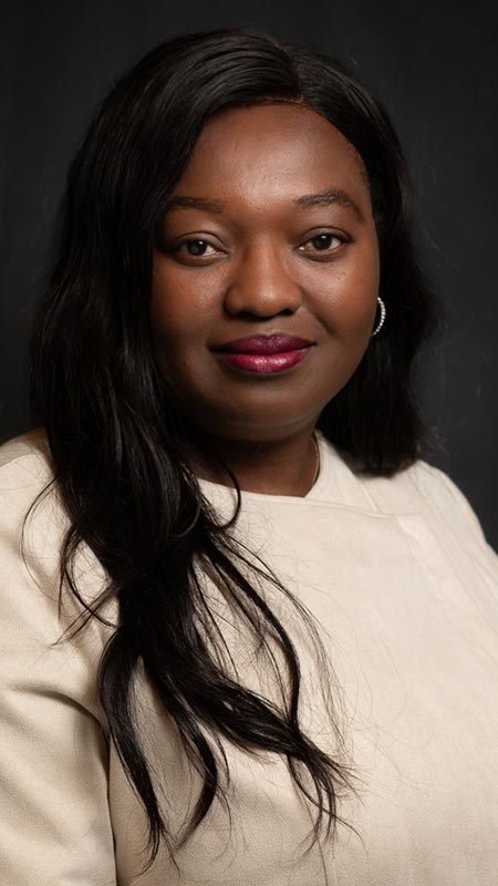 portrait of Bukola Daramola in an off-white shirt