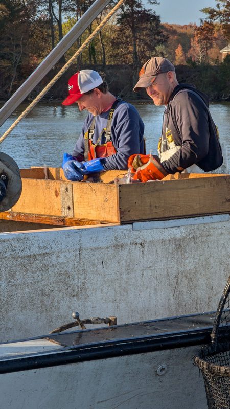 two men from Tilghman Island Seafood an LFPA Partner