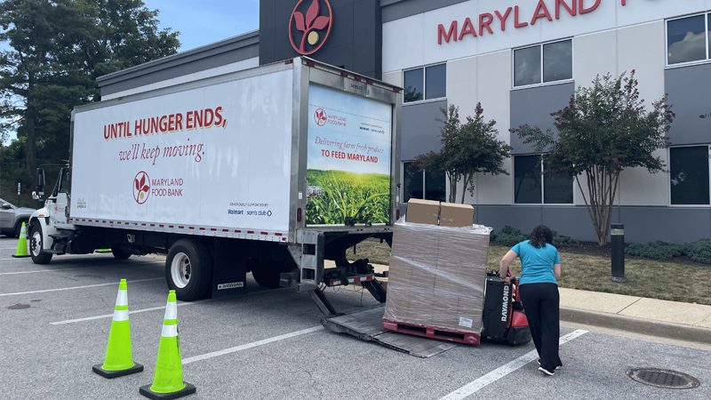 Dawn Glover of Gabrielles Place loads a palette onto the trucks lift gate