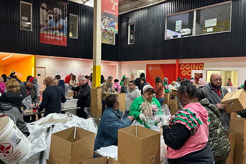 Maryland Food Bank volunteers repackage bulk rice during Martin Luther King, Jr. Day of Service event
