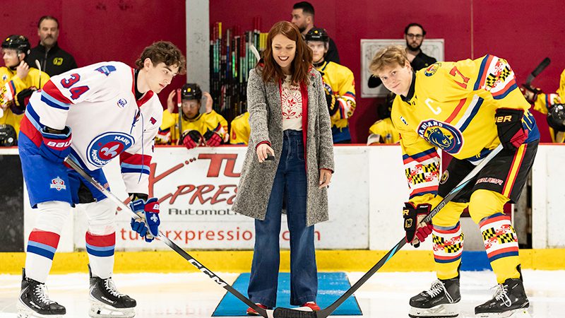 Maryland Food Bank representative drops the puck for the game